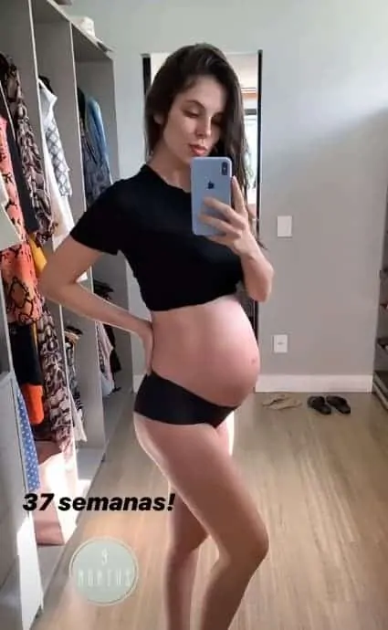 Esposa de Mano Walter com sua barriga de grávida