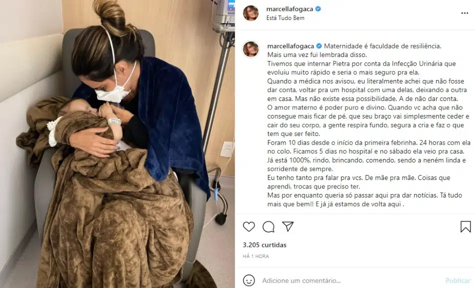 A esposa de Joaquim Lopes com uma das gêmeas do casal no hospital