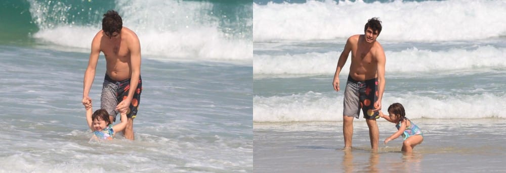 Rafael Vitti brinca com a filha na praia