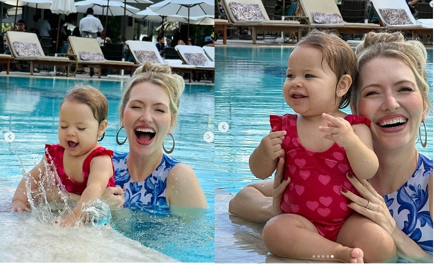 Esposa de Edson Celulari surge com sua bebê na piscina de hotel de luxo