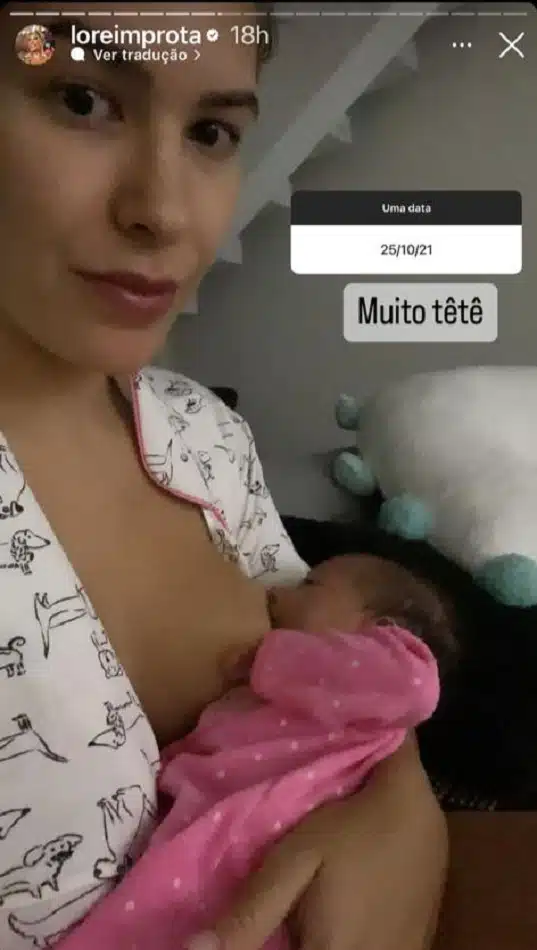 Liz, bebê de Lore e Léo Santana, no colo da mamãe