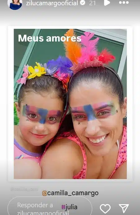 Zilu mostrando a sua filha e a sua neta