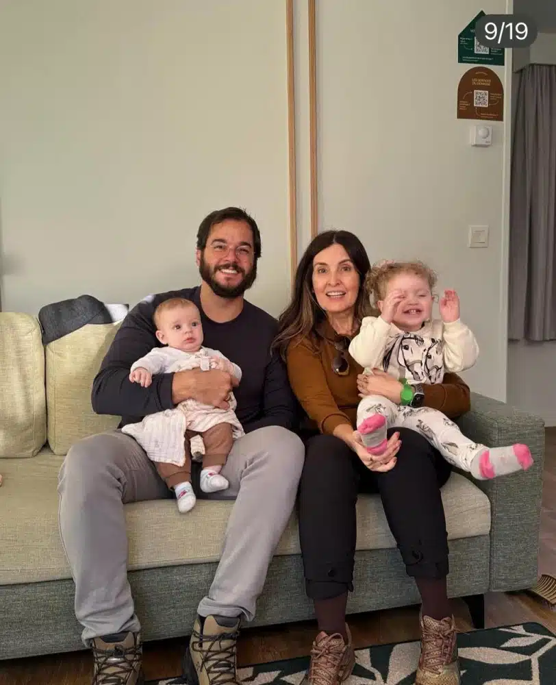 Fátima Bernardes com seu atual companheiro e a família dele