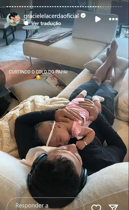 Zezé Di Camargo junto com a filha na cobertura da praia