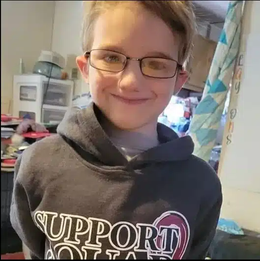 O menino Clayton antes do que fez ao pai