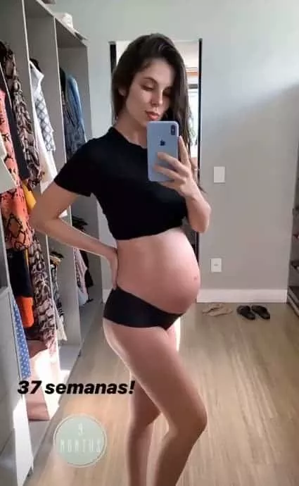 Esposa de Mano Walter com sua barriga de grávida