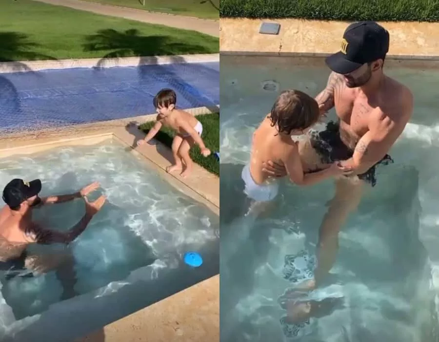 Gusttavo Lima com os filhos em uma piscina