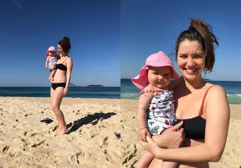 Nathalia Dill com sua bebê Eva na praia pela primeira vez